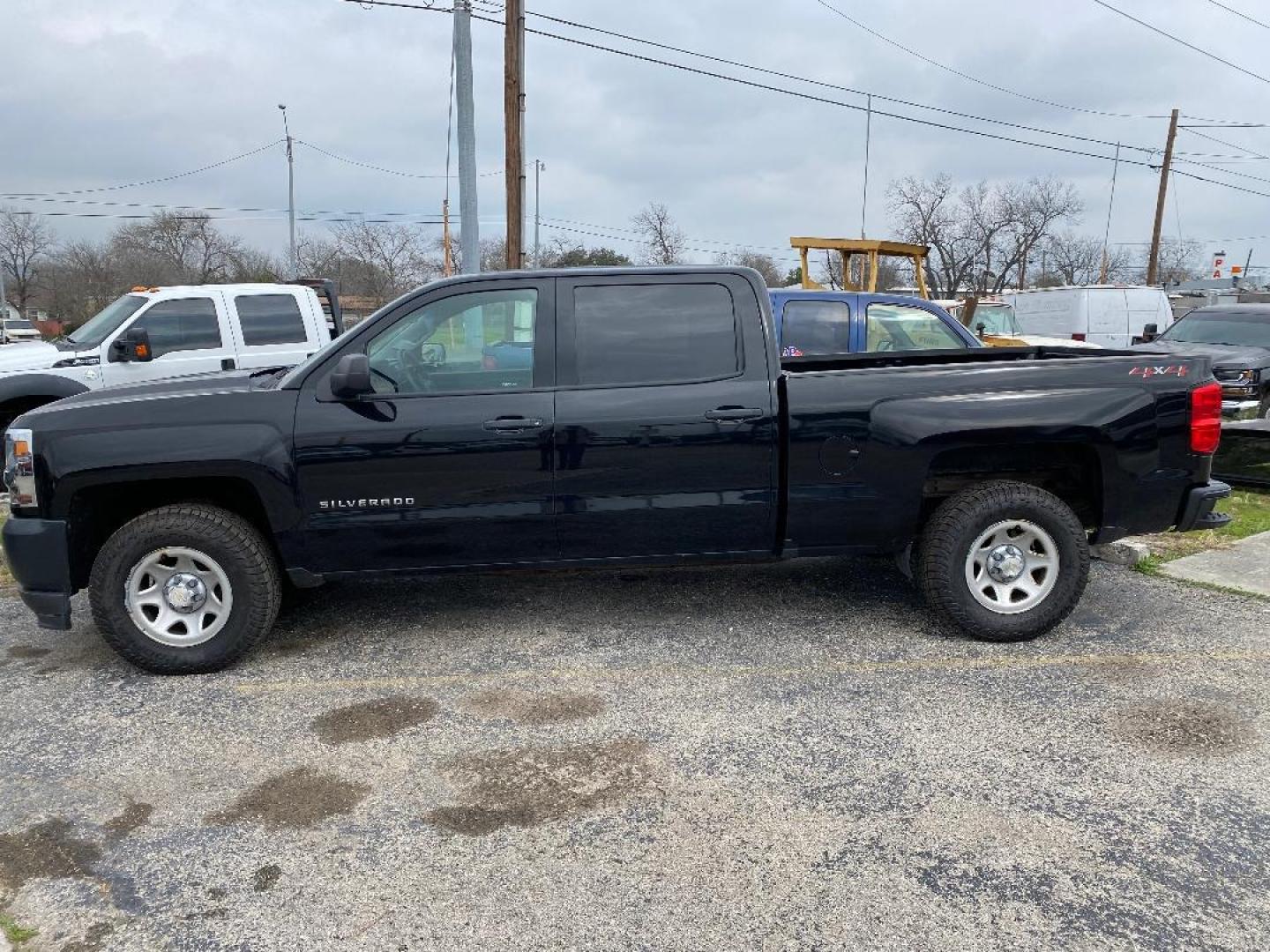 2018 Black Chevrolet Silverado 1500 LS Crew Cab Long Box 4WD (3GCUKNEC6JG) with an 5.3L V8 OHV 16V engine, 6A transmission, located at 1687 Business 35 S, New Braunfels, TX, 78130, (830) 625-7159, 29.655487, -98.051491 - Photo#1